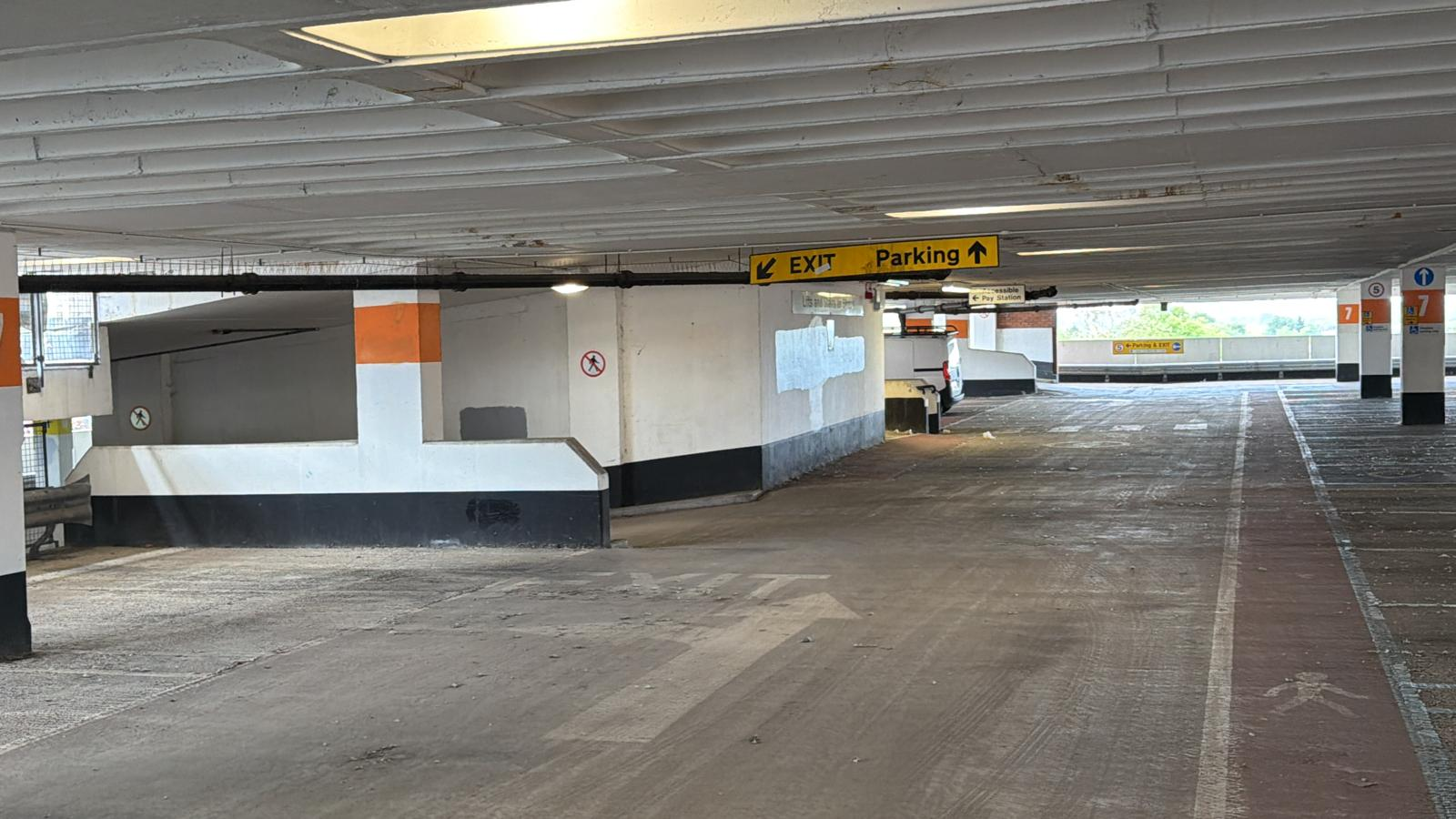 Marked exit and parking direction signage