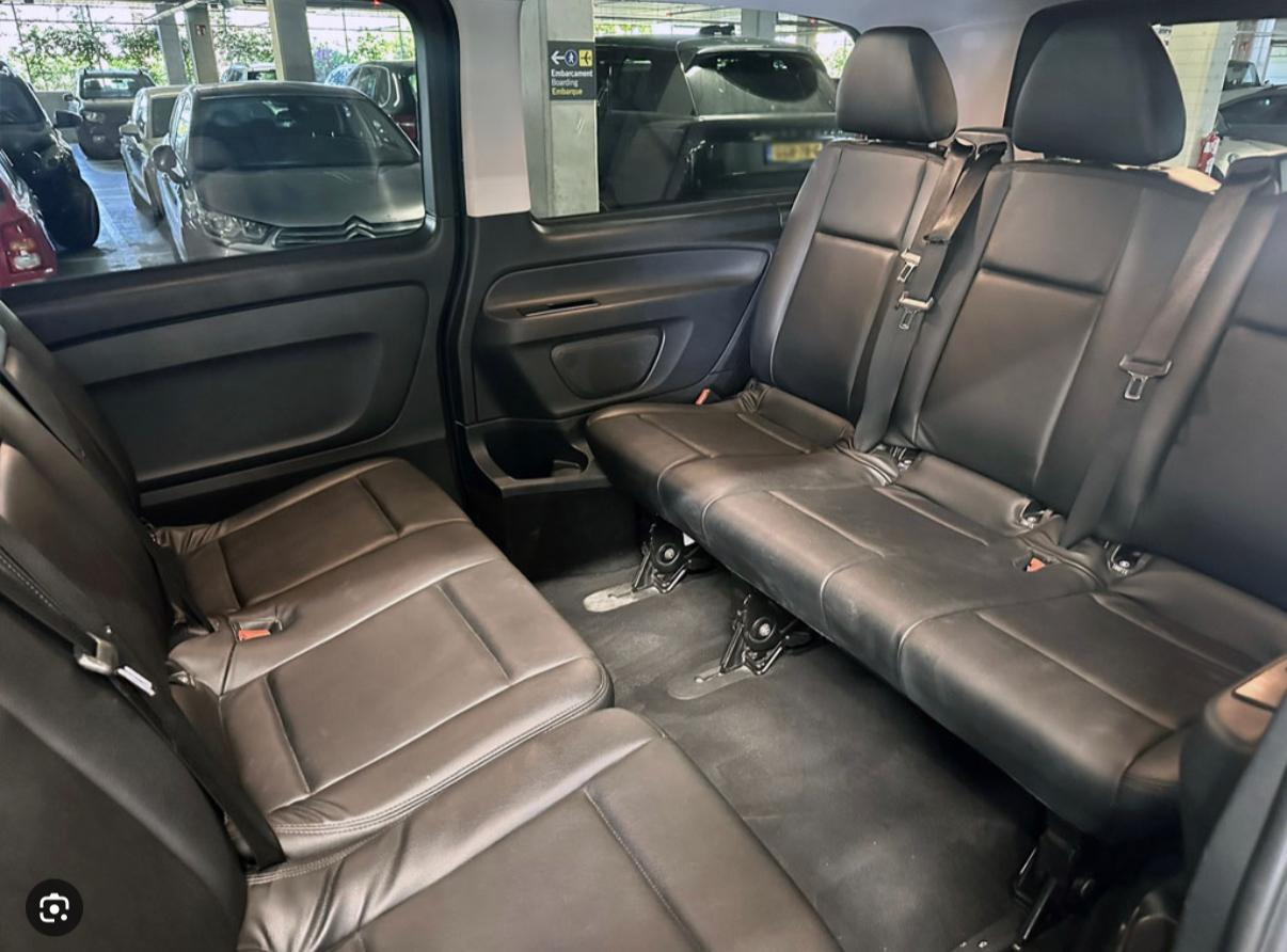 Spacious leather interior of the Heathrow Car Park shuttle